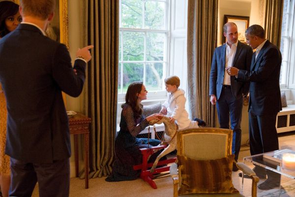 Sweet George looked charming in his pyjamas and dressing gown as he shook hands with Barack and Michelle Obama