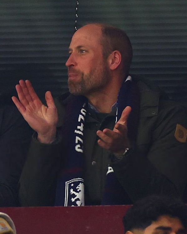 A very excited Prince William celebrating with friends as his team, Aston Villa won