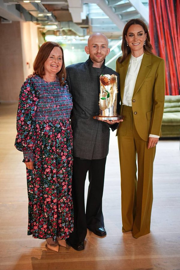The Princess of Wales posing with the recipient of Queen Elizabeth II Award for British Design, designer Patrick McDowell
