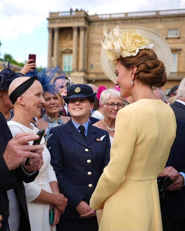 The Princess of Wales this afternoon speaking to attendees of the garden party at Buckingham Palace