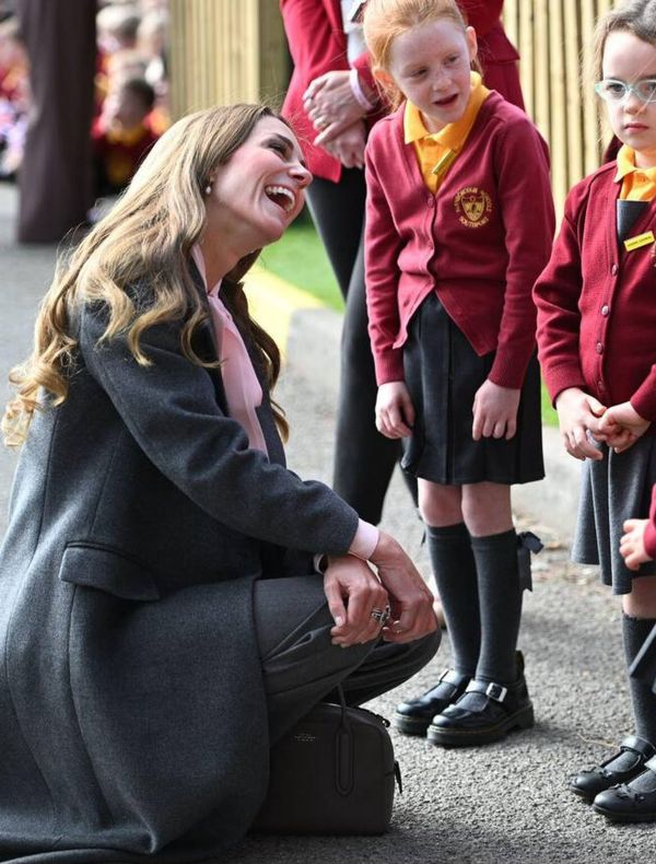 The Princess of Wales with children at Farnborough Road Infant and Junior School in Southport