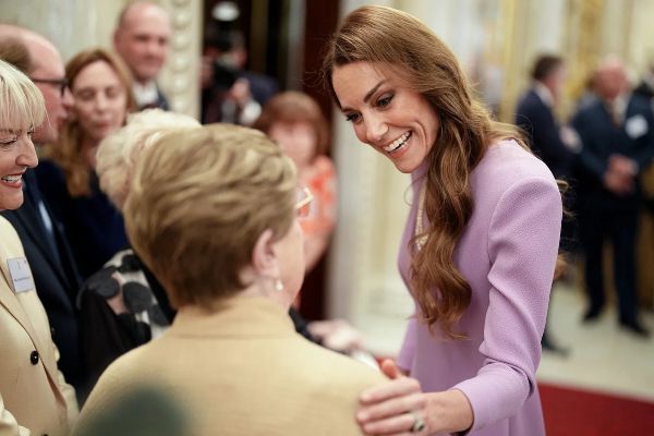 Kate Middleton speaks to Joan Illingworth during a reception to celebrate the life of the late Queen Elizabeth at Buckingham Palace in central London on April 21, 2026